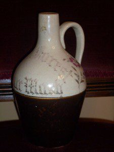 ANTIQUE WHISKEY JUG PAINTED