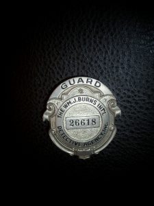 OLD BADGE.