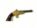 Partial view of an antique handgun with a wooden grip and metal barrel set against a white background.